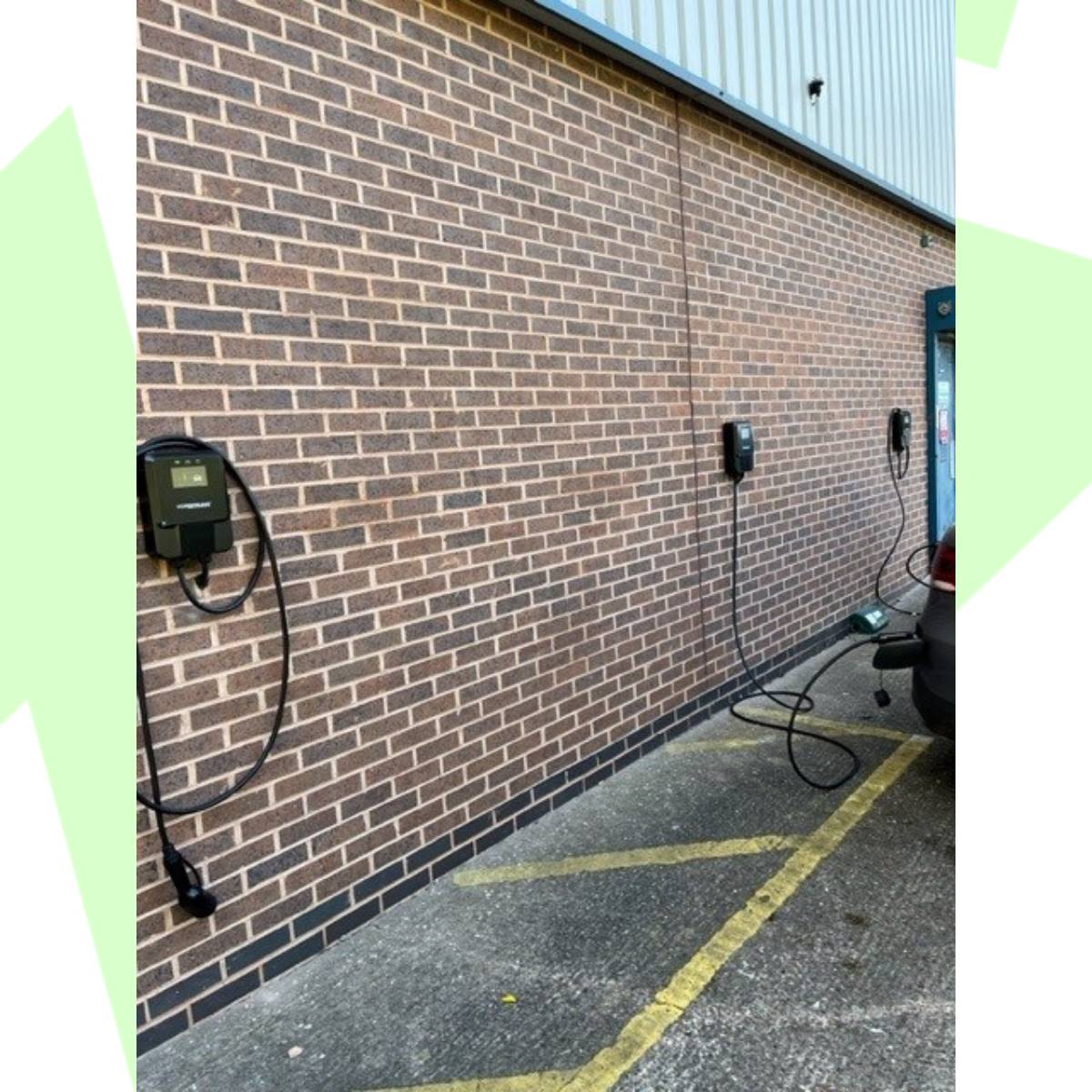 Brick Wall, Parking Spaces with Electric Car Chargers